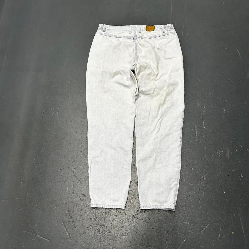 Vintage 90s women's blue light washed Lee baggy tapered straight leg Jeans